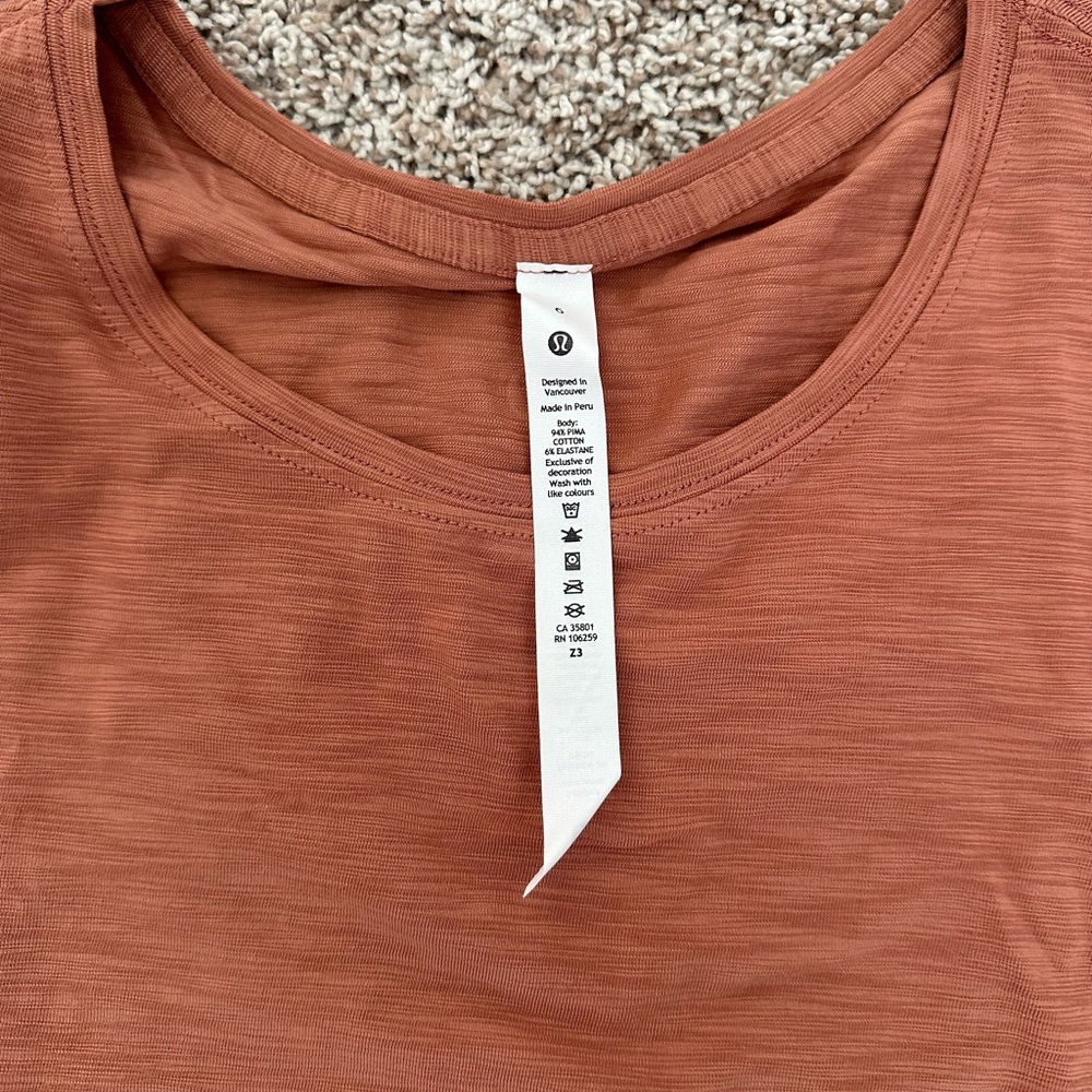 Lululemon Athletica Ruffled Orange Short Sleeve Top - Picture 2 of 3